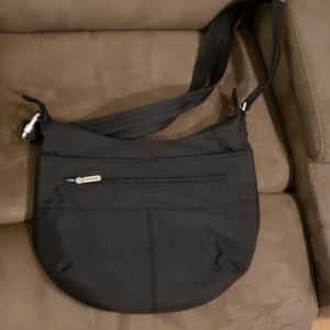 Anti theft cross body bag